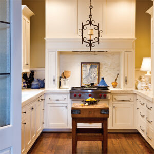 Southern Home Vintage Cottage 2022 White Kitchen with Brown Table
