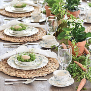 Easter Table With White Table Setting With Greenery Featured in Entertain & Celebrate Spring 2022