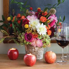3 apples wine glass and flowers
