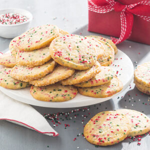cookies with sprinkles on white plate