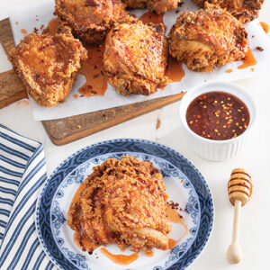 Chicken pieces and a plate