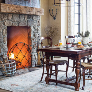 formal dining table next to fireplace