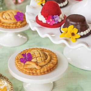 Mini pies on small white cake trays