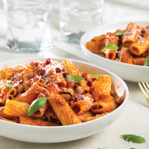 rigatoni in white bowls