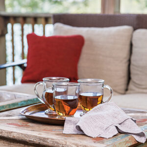 three drinks glasses on outdoor table