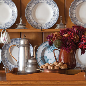 Blue floral china on wooden cabinet