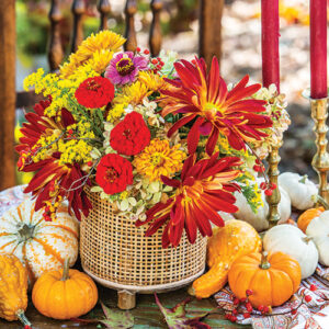 floral arrangement with pumpkins