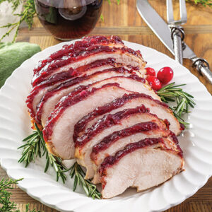 sliced turkey breast with cranberry sauce