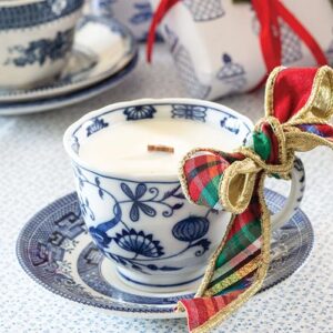 teacup candle with christmas ribbon