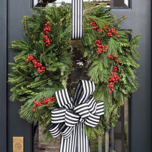 christmas wreath hanging on front door