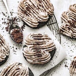 Oreo dessert with icing and cookie crumbles