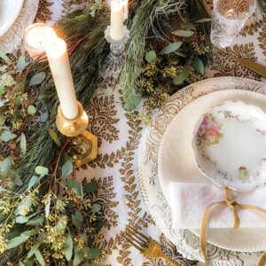 Winter whites and greenery tablescape