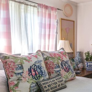 floral monogram bed pillows in bedroom