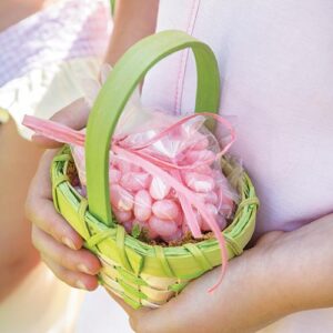 Green easter basket with pink eggs