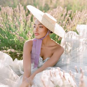 Julie Paisley in beautiful dress and hat in field