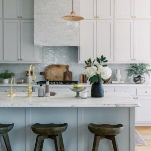 Light blue island in white kitchen