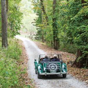 Car driving down back road