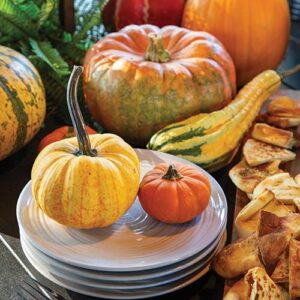 Fall Pumpkins on stacked plates