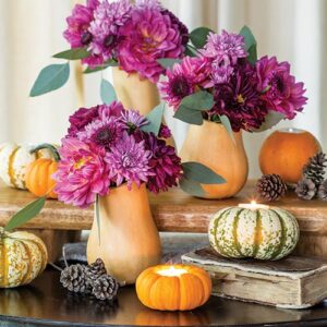 table decor flowers and pumpkins