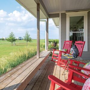 Red rocking chairs and patio