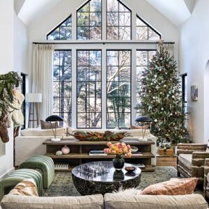 Full wall of windows and a Christmas tree