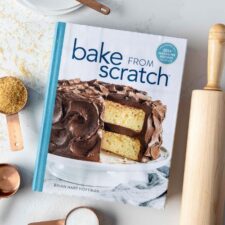 Bake from Scratch Volume 9 Book Surrounded by Backing Tools and Ingredients