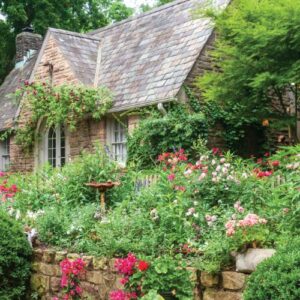 Vic Seasonal Flowers garden in front of rock cottage