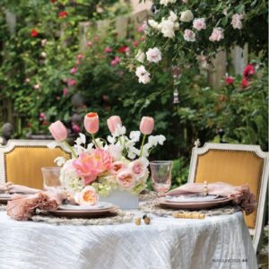 Southern Lady May_June 2025 featuring outdoor dining table with pink and green tablescape in rose garden