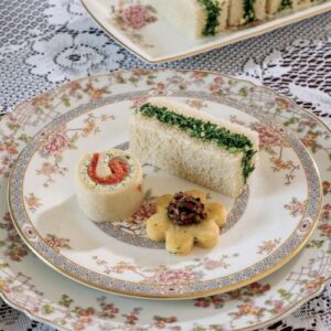 TeaTime Magazine May_June 2025 cover featuring plate of small bites and sandwiches