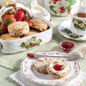 TeaTime Magazine May_June 2025 cover featuring strawberry teapot on tablescape with scones and jam