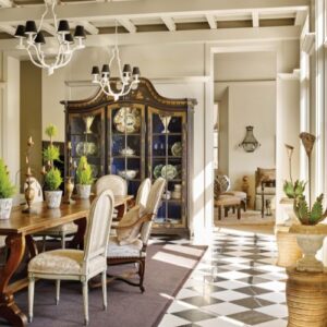 Inviting Southern Home Interior Design with dining room with checkered floor and topiaries on table