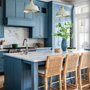 Southern Home July_August 2025 featuring blue kitchen cabinetry