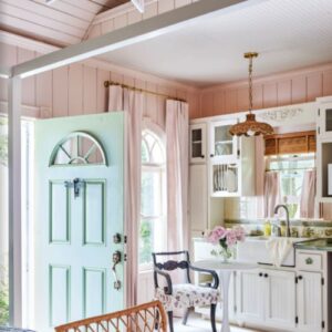 Southern Home July_August 2025 featuring pink kitchen with blue door