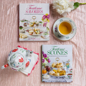 Teatime Savories and Teatime Scones Books surrounded by fine china and a flower