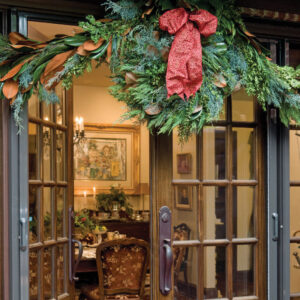 Holiday front door entrance with wreath