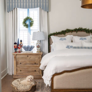 Wreath in window with dog