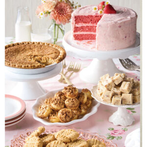 Dessert spread with strawberry cake, pecan tarts, dessert