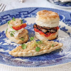 Tea sandwiches on a blue and white plate