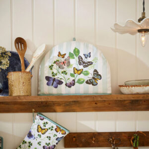 Butterfly tea cosy with blue stripe, purple, green, and pink