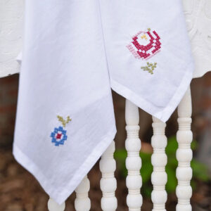 Hand stitch napkin with blue and pink stitch