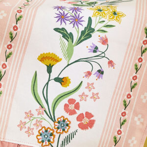 Pink stripe tea towel with green, pinks, and yellow