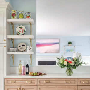 Kitchen counter with flowers and shelves
