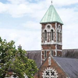Church in distance with limestone roof