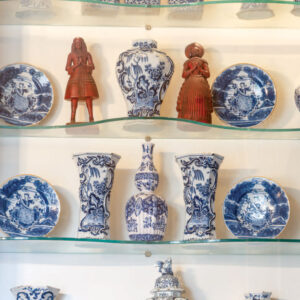 Blue and white china transferware on shelf