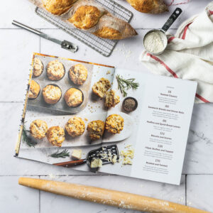Bread Baker's Companion Table of Contents with flour, loaf of bread, and rolling pin