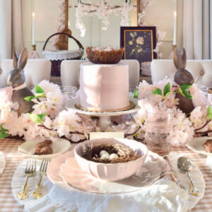 Pink Easter setting with chocolate bunnies and pink cake