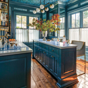 Dark blue kitchen with various color accents