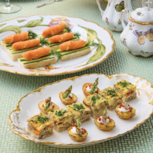 Tea bites on white plate and green tablecloth