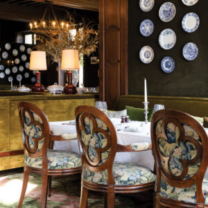 Dining area with blue and white wall hangings