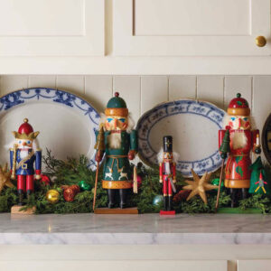 Kitchen display of nutcrackers and blue and white plates